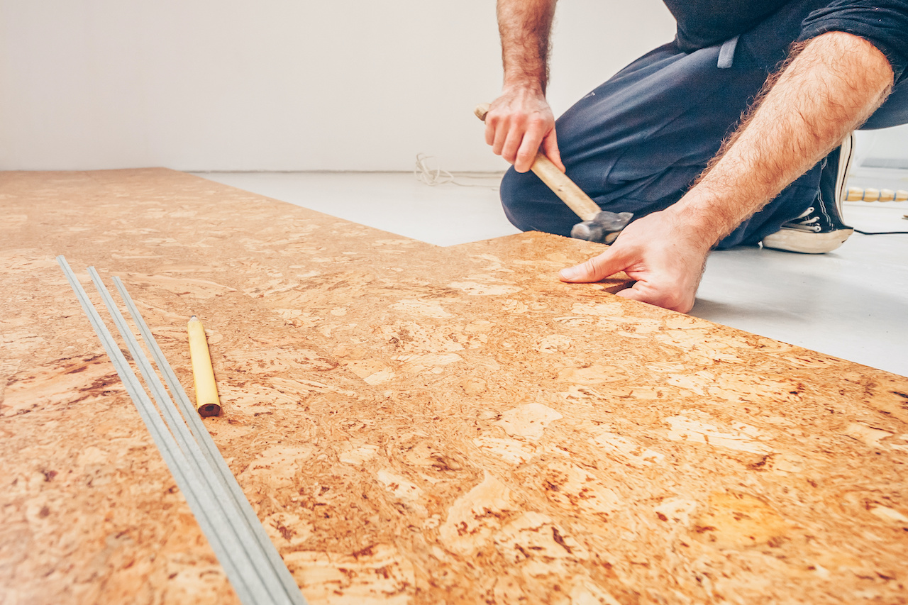 Professional installing cork flooring