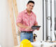 Flooring contractor using a tablet to review job costs on-site.