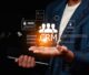 Businessman using digital customer relationship management CRM interface to manage customer data and marketing solutions.